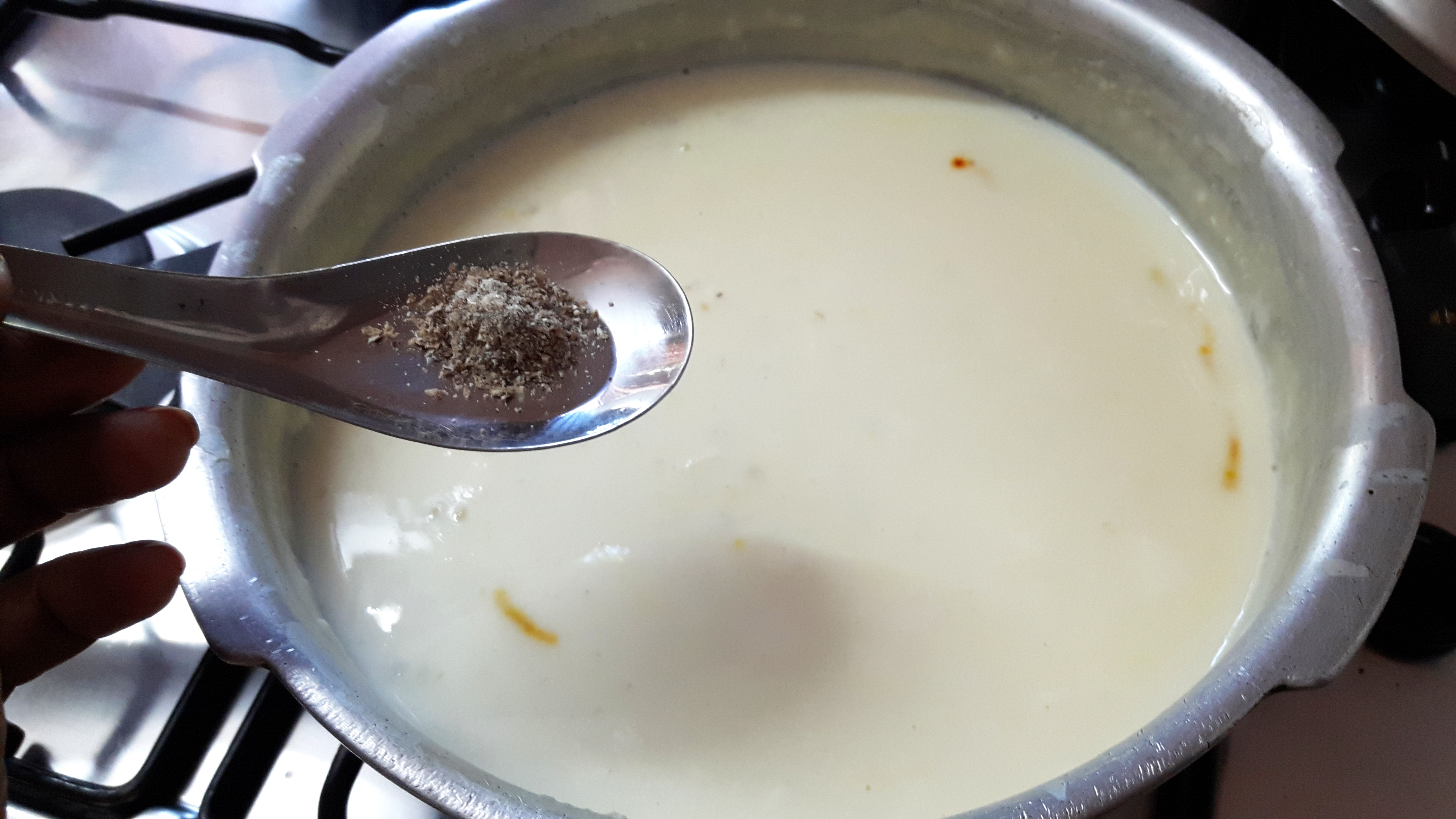 Add sugar and green cardamom powder