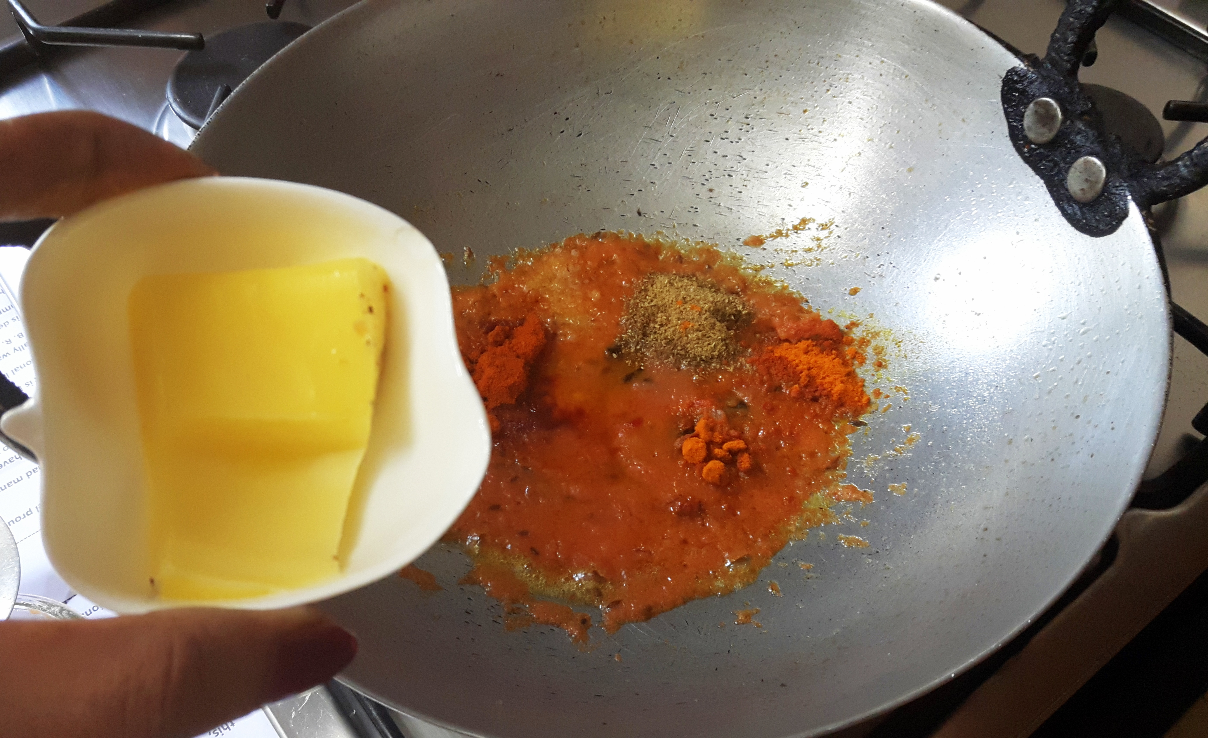 Add chilly powder, coriander powder and turmeric powder and 20 gm of butter