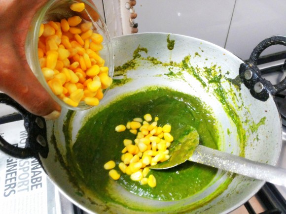 adding fresh corn