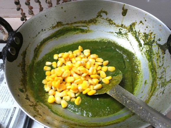 adding fresh corn