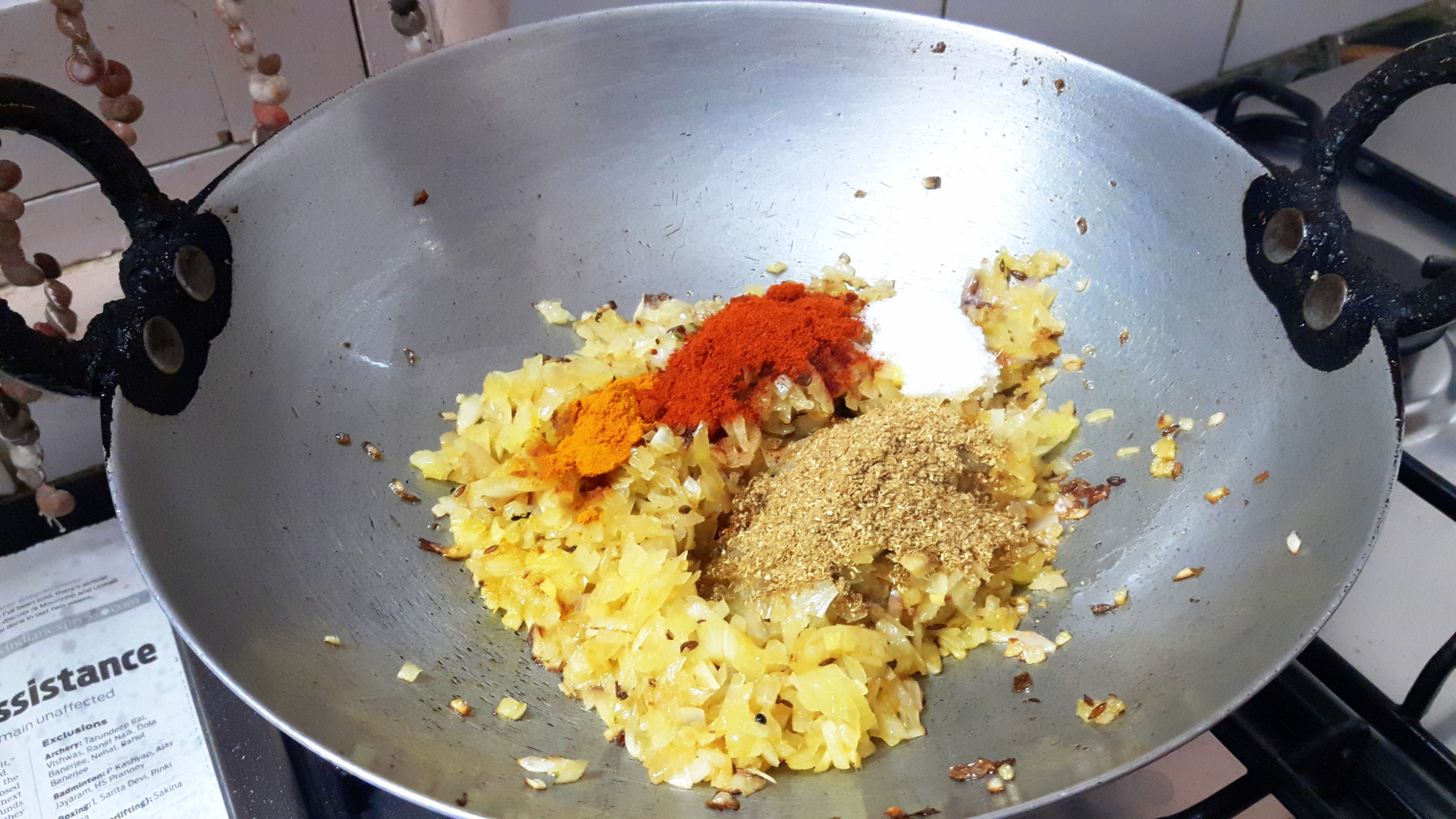 Add chilli powder, coriander powder, turmeric powder and salt
