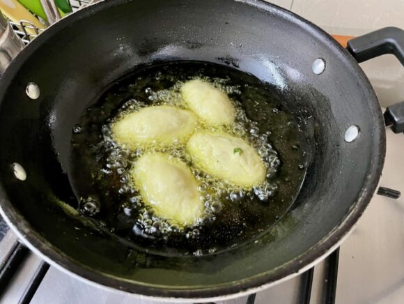Deep fry each kofta till it gets golden brown