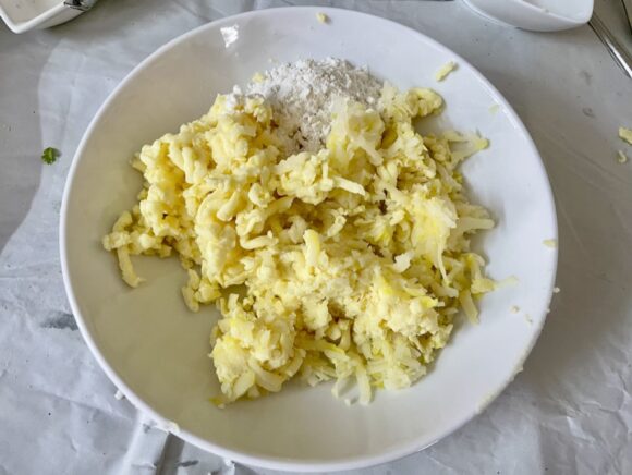 mix Salt, Mawa, Maida, boiled & grated potato