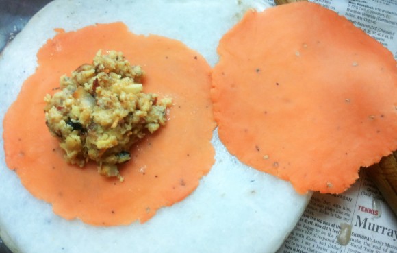 stuffing in the centre of the poori 