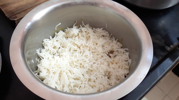 Add layer of cooked rice
