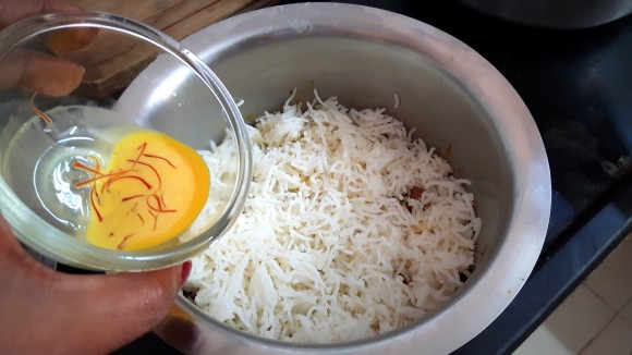 Add half of the saffron milk