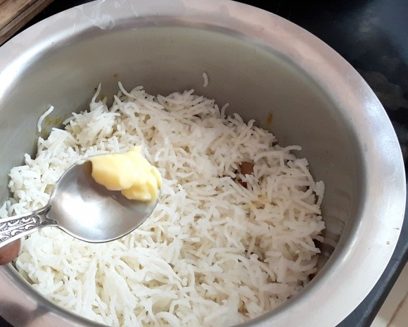 fried onion and 1 tablespoon of butter, ginger Julian Garam masala powder, rose water and kewada essence. 