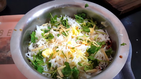 Add layer of cooked rice. Add remains half of the saffron milk