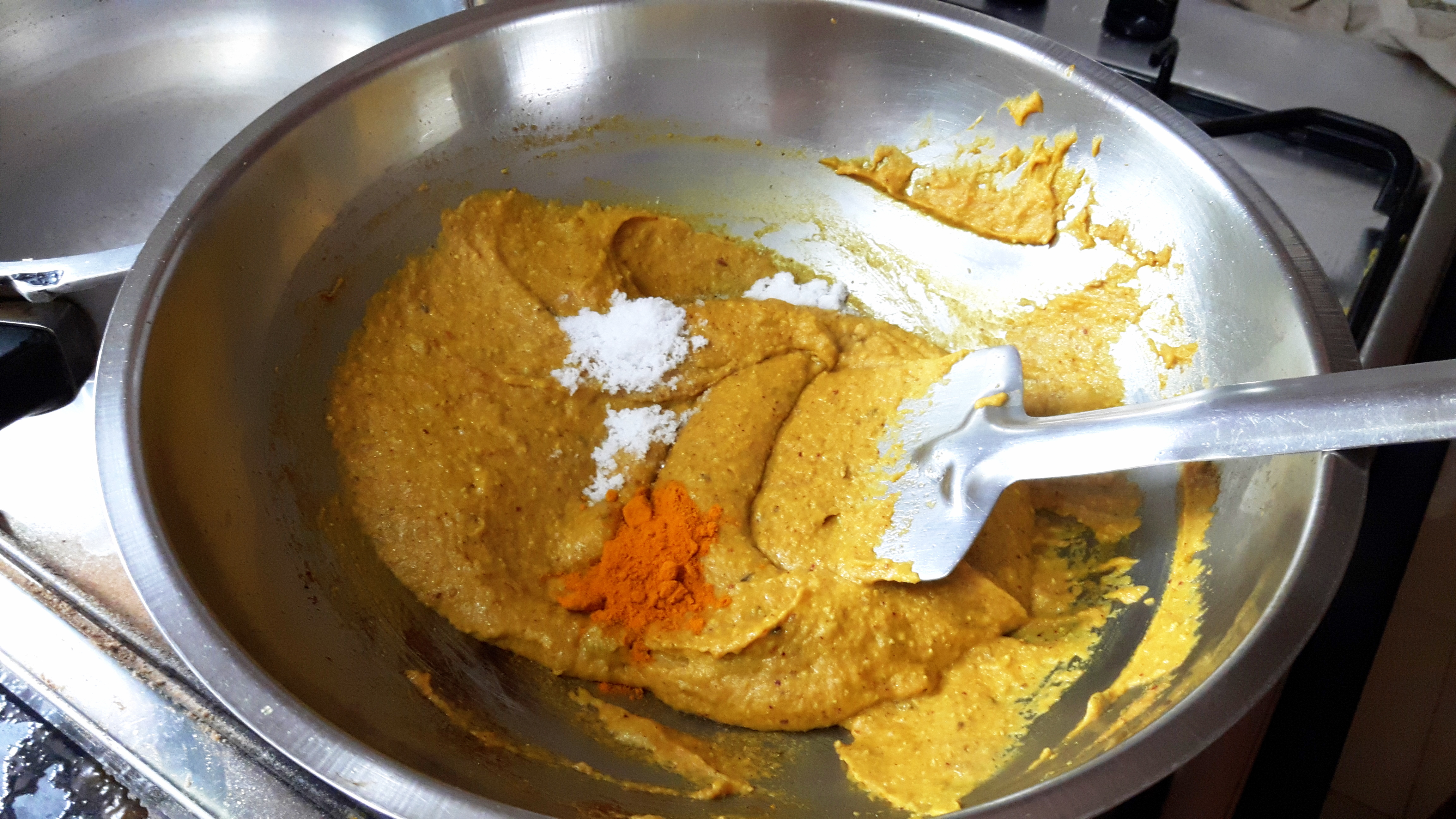 add salt and turmeric powder