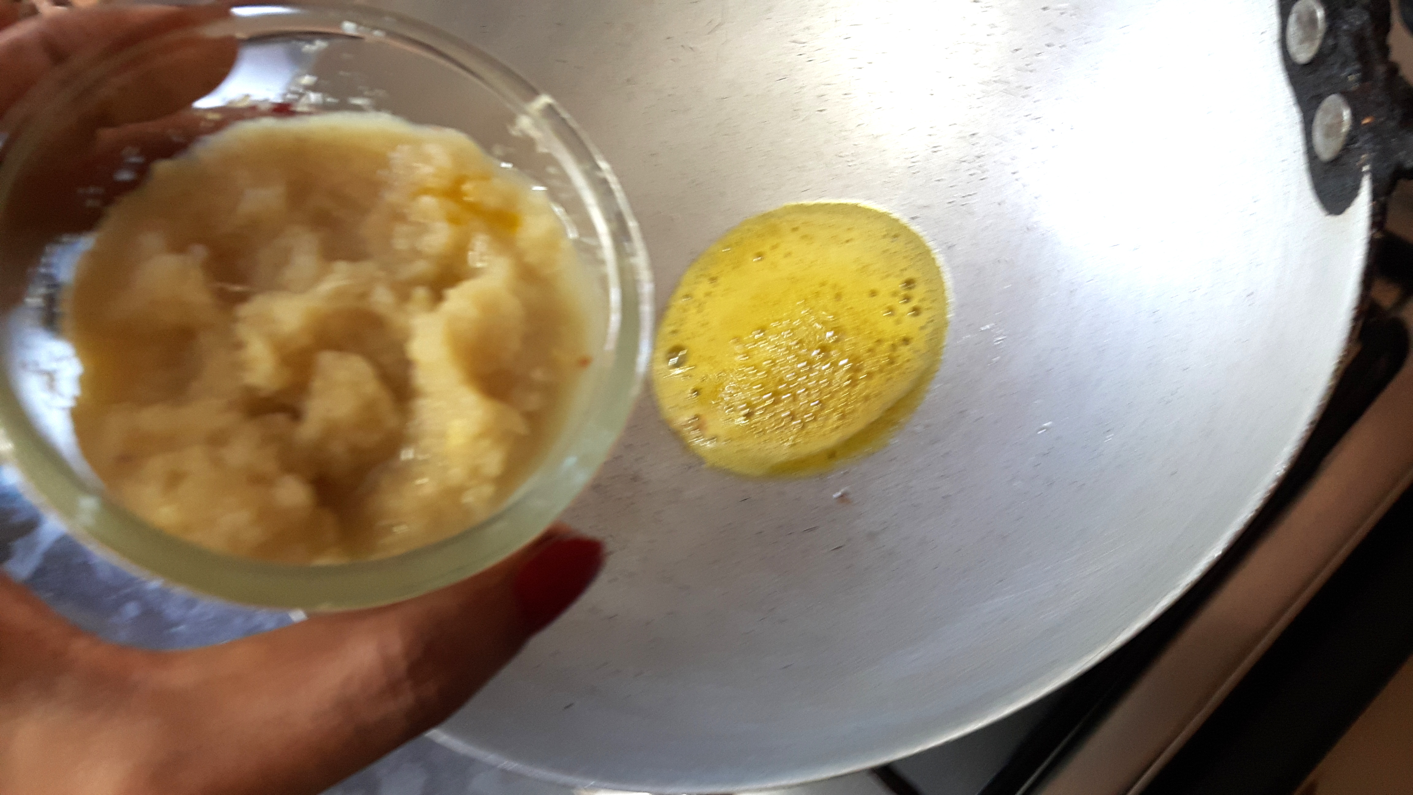 put asafetida and grinded wet masala