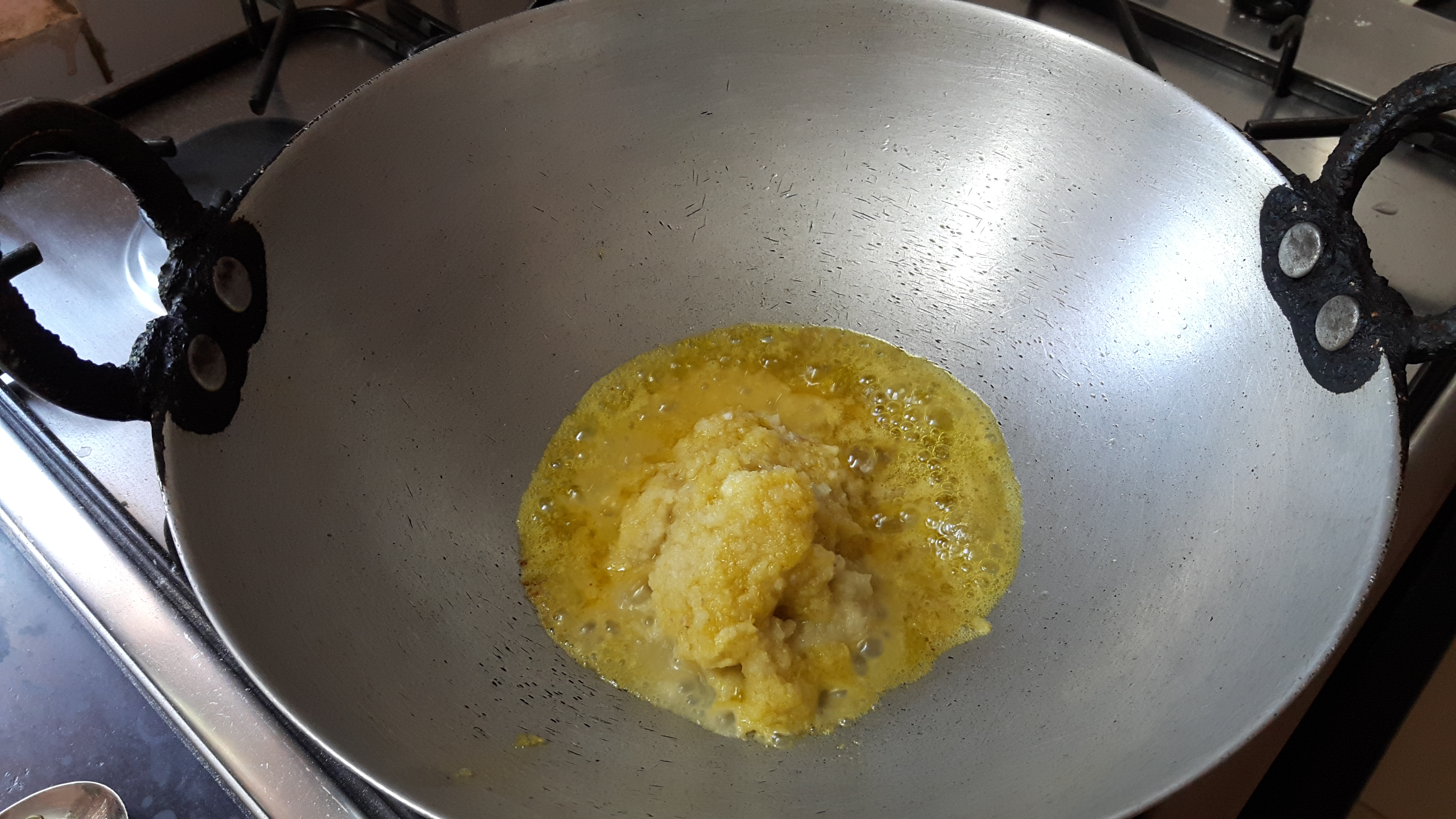 put asafetida and grinded wet masala