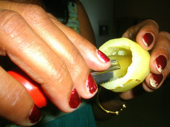 Scoop out the inner portion of potato