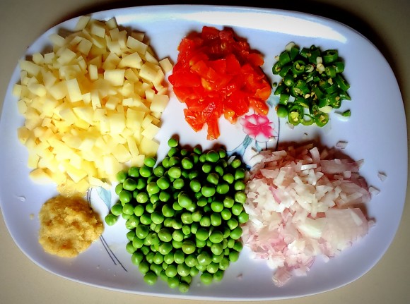Ingredients of Aaloo (potato) mutter (peas) ki sabji