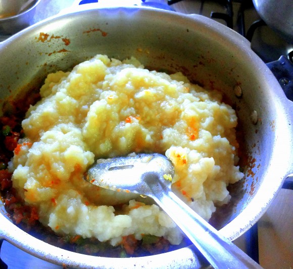 adding mashed vegetables
