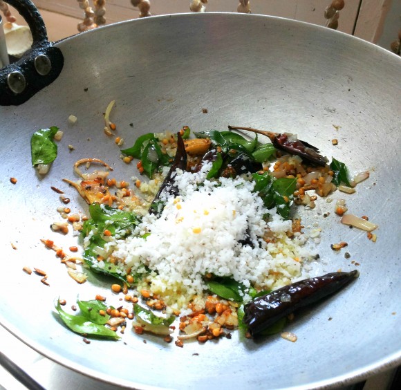 adding scrap fresh coconut