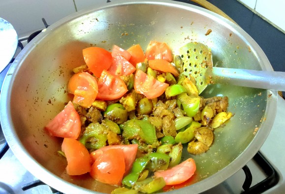 adding tomato