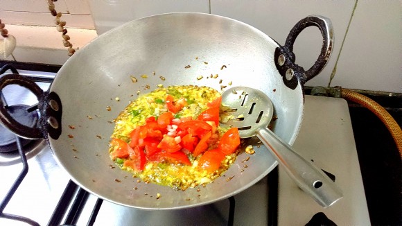 adding tomato