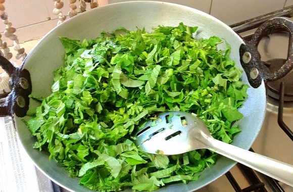 cooking Chaulai (amaranth)