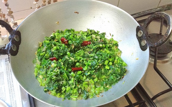 cooking Chaulai (amaranth)
