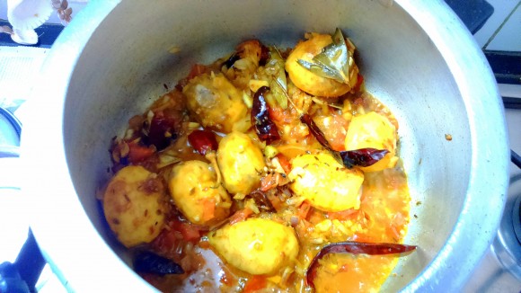 adding marinated potatoes