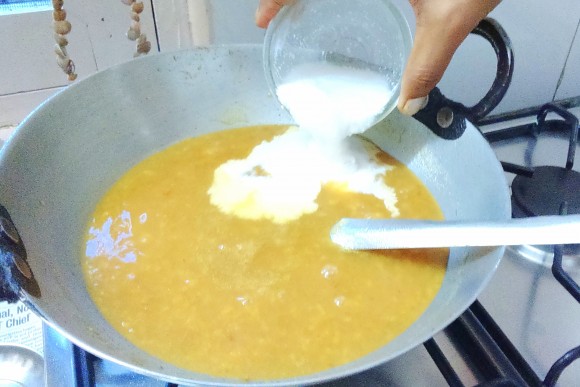 adding coconut milk