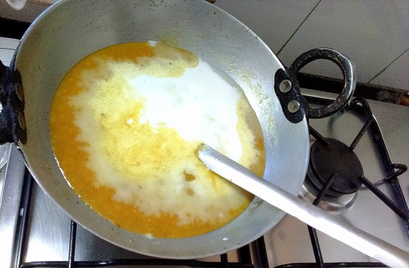 adding coconut milk