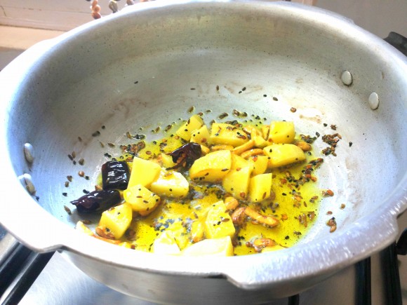 adding potatoes