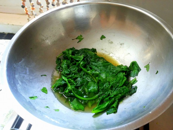 Boil palak (spinach) 