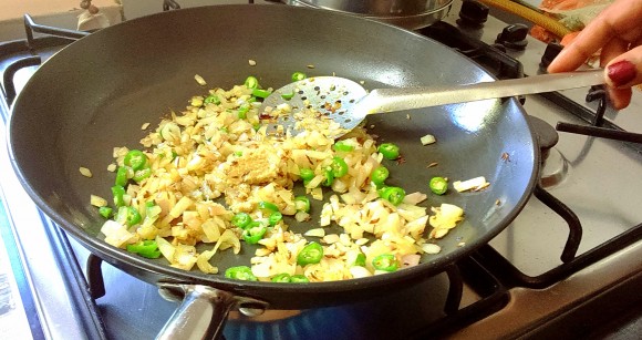 Adding chopped onion and chili
