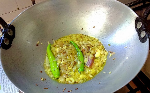 frying onion and green chili