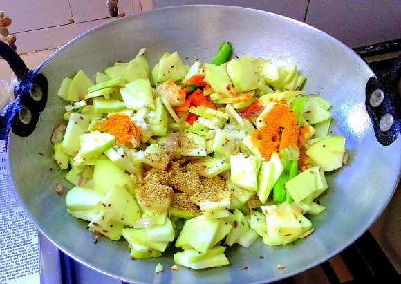 adding masala and raw papaya