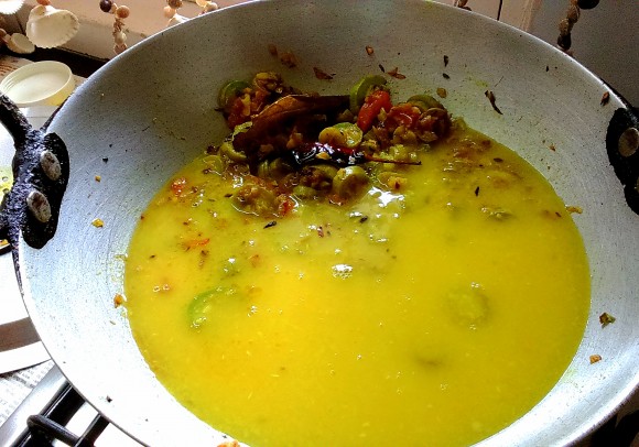 adding cooked dal