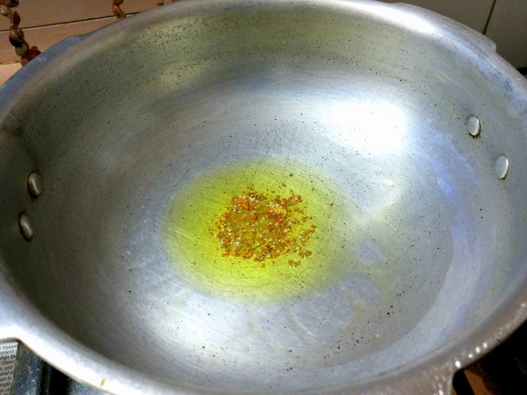 crushed cardamom in the ghee