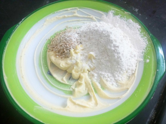 Add Maida along with baking powder 