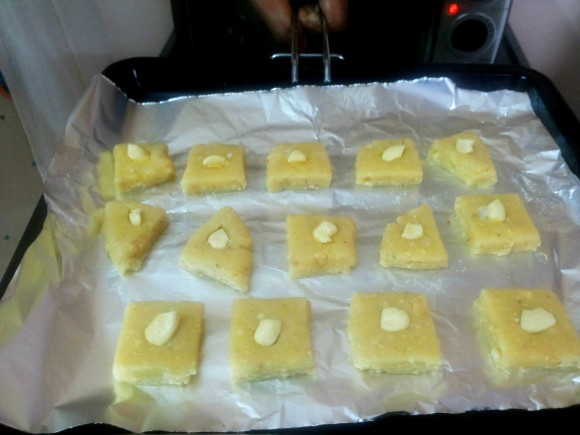 Place the raw biscuit in the baking tray