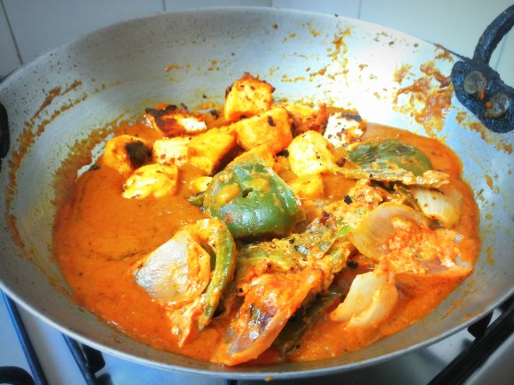 Add onion, capsicum and paneer tikka 