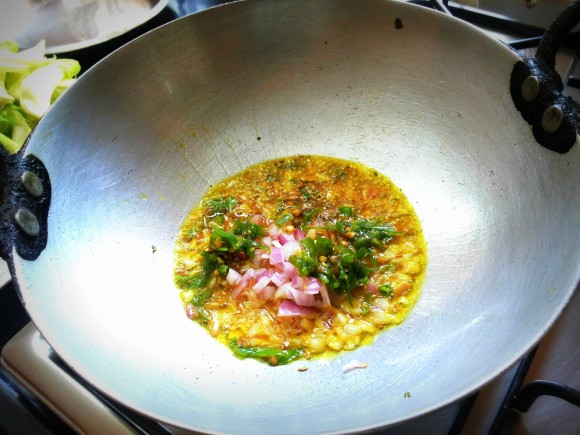 Add onion and green chili