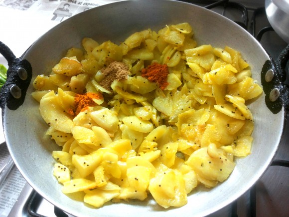 add chili powder, coriander powder, turmeric powder