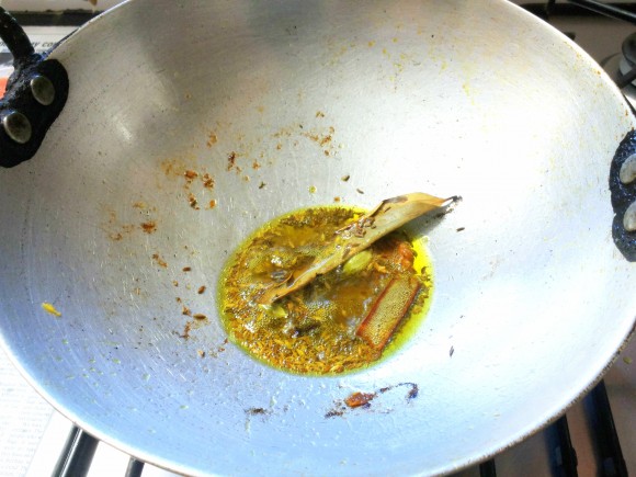 Add cumin seeds, cinnamon and bay leaf 