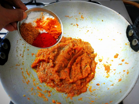 adding chili powder, coriander powder, turmeric powder and salt 