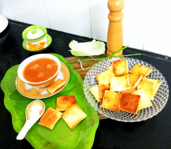 hot soup with croutons (small pieces of fried bread)