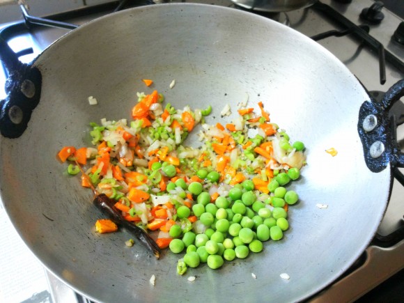 Add carrot, French beans, onion, peas 