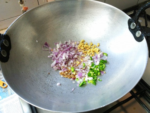 Add onion, green chili and ginger