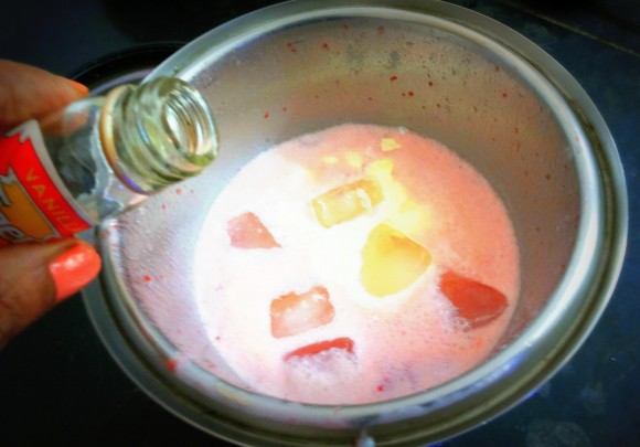 add ice cubes and vanilla essence, and churn again for a while.