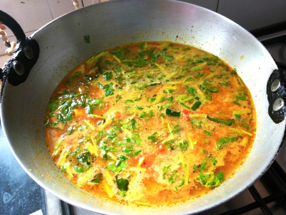 Add salt and tamarind pulp and fresh coriander leaves 