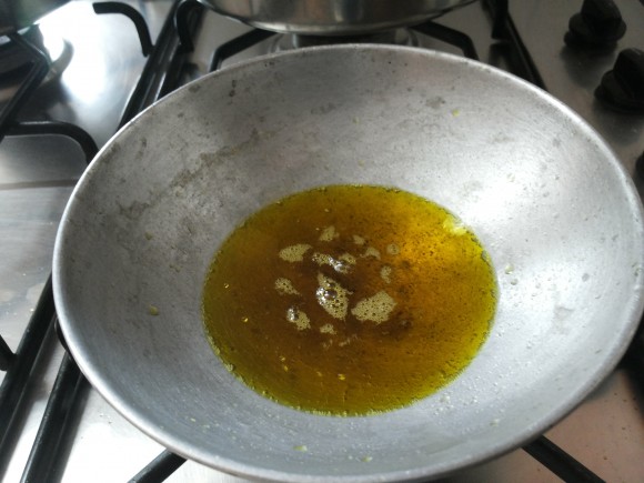 Heat oil 