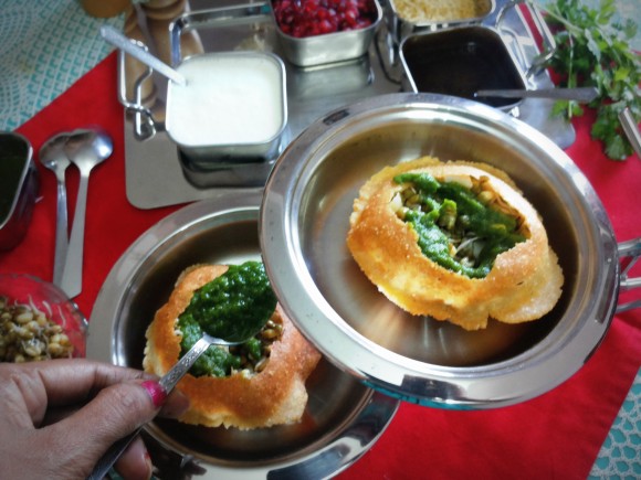 Fill with potato cubes, sprouts and green chutney