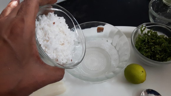put fresh coconut, coriander leaves, ¼ spoon salts and ½ teaspoon of roasted cumin powder.
