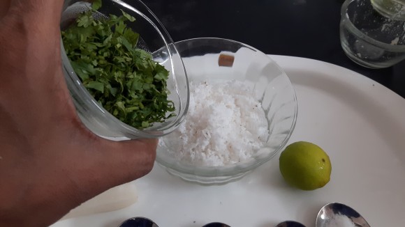 put fresh coconut, coriander leaves, ¼ spoon salts and ½ teaspoon of roasted cumin powder.