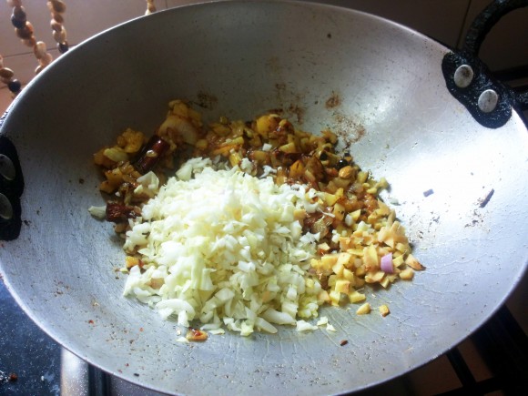 Add potato, cabbage and tomato